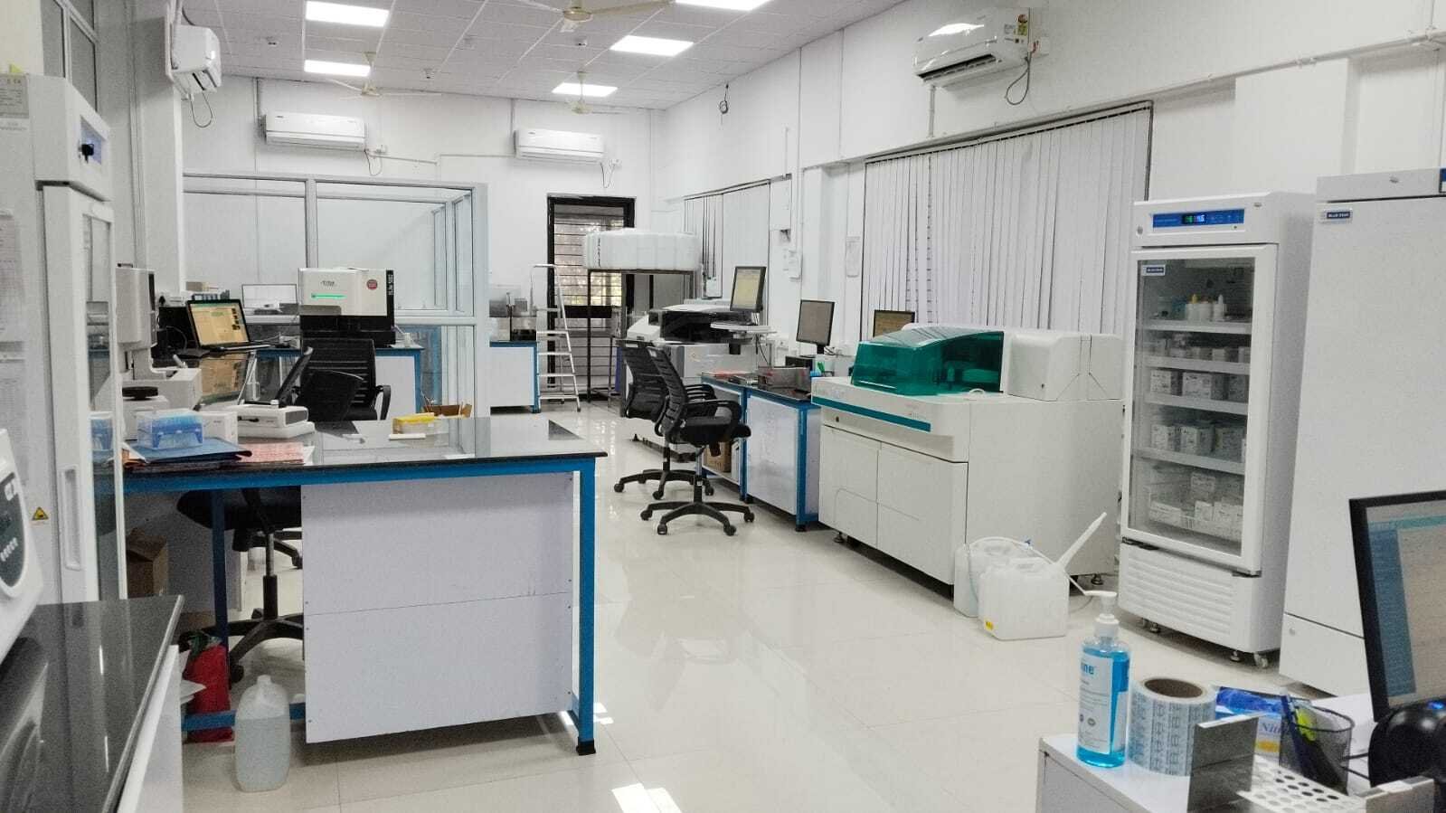 Inside MyMedpath Diagnostic laboratory in Pune, showing analyzers and testing equipment